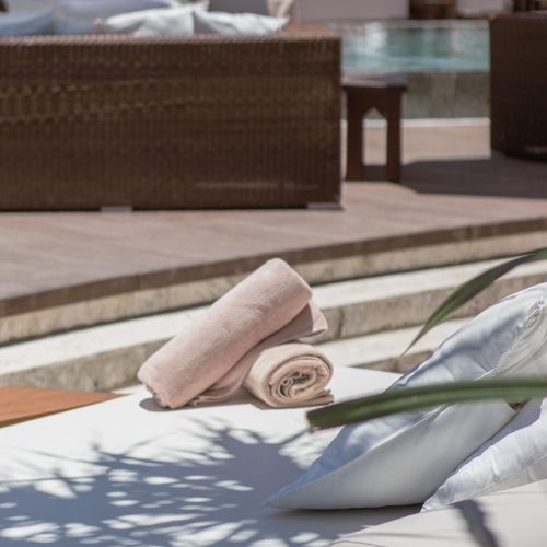 rolled up beach towels